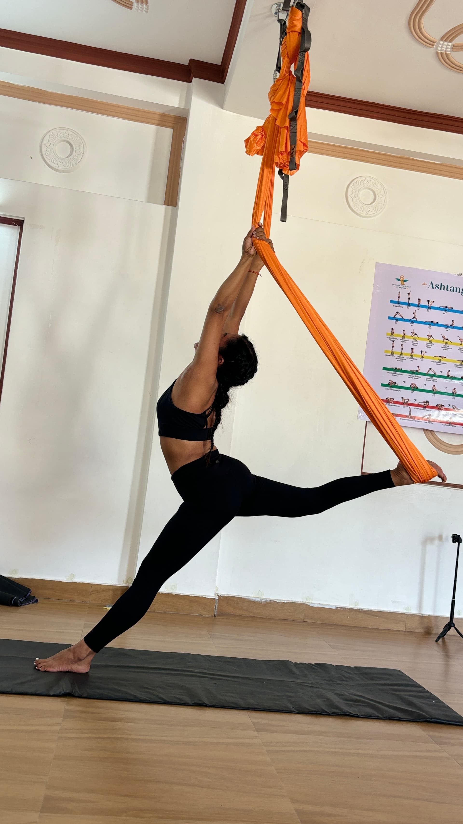 Aerial yoga marina pose