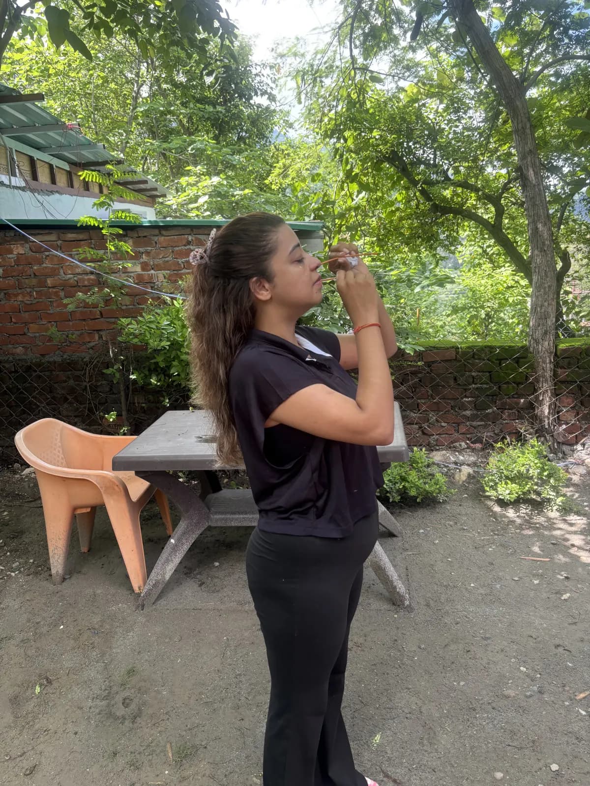 Student practising Jala Neti nasal cleansing, a shatkarma technique taught in yoga teacher training