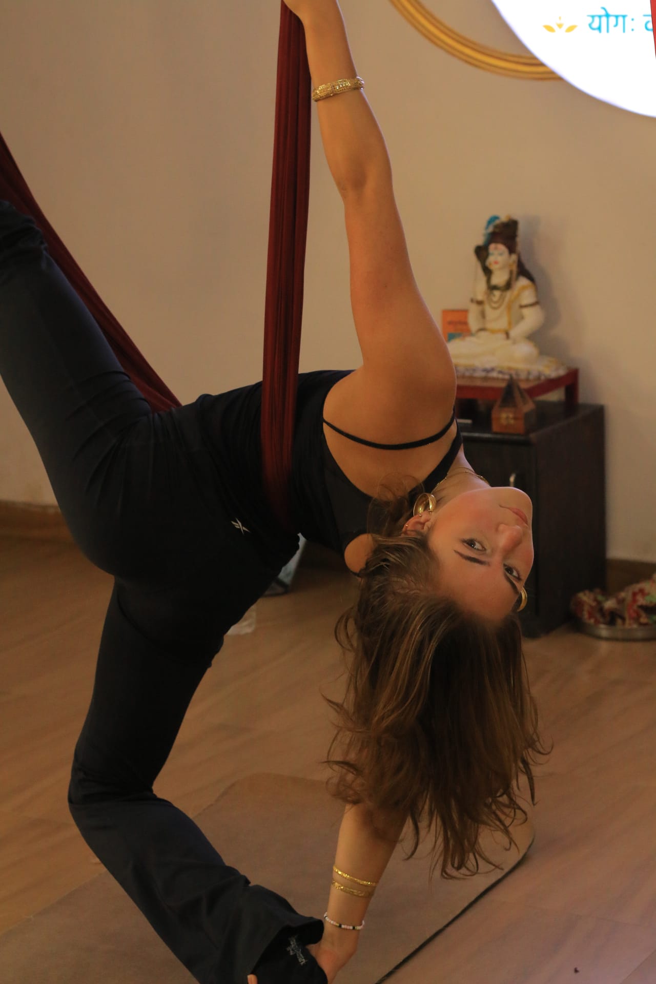 Strength building in aerial yoga